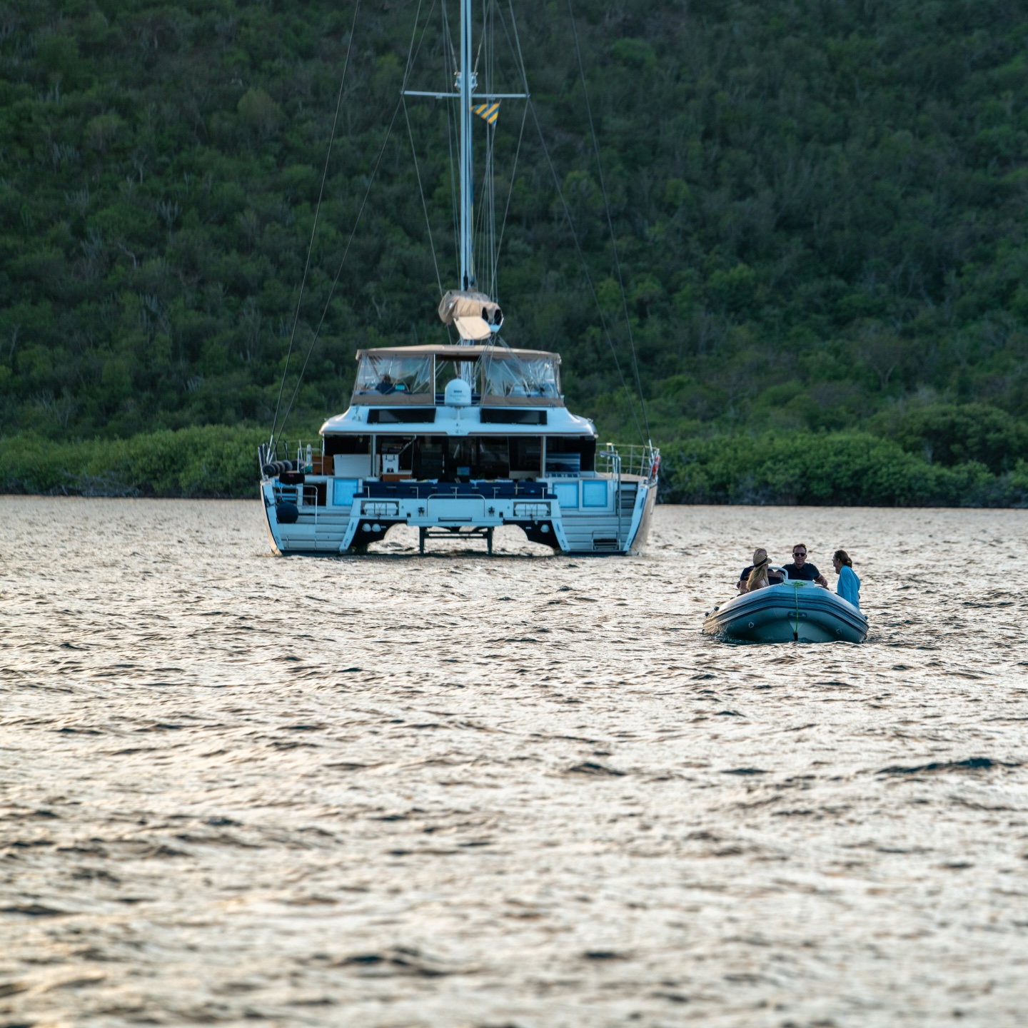 Andromeda passengers traveling from the anchored catamaran to Anguilla.