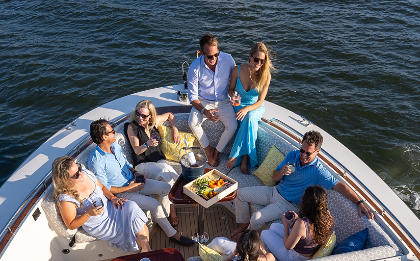 Outdoor dining setup on a Barton & Gray yacht.