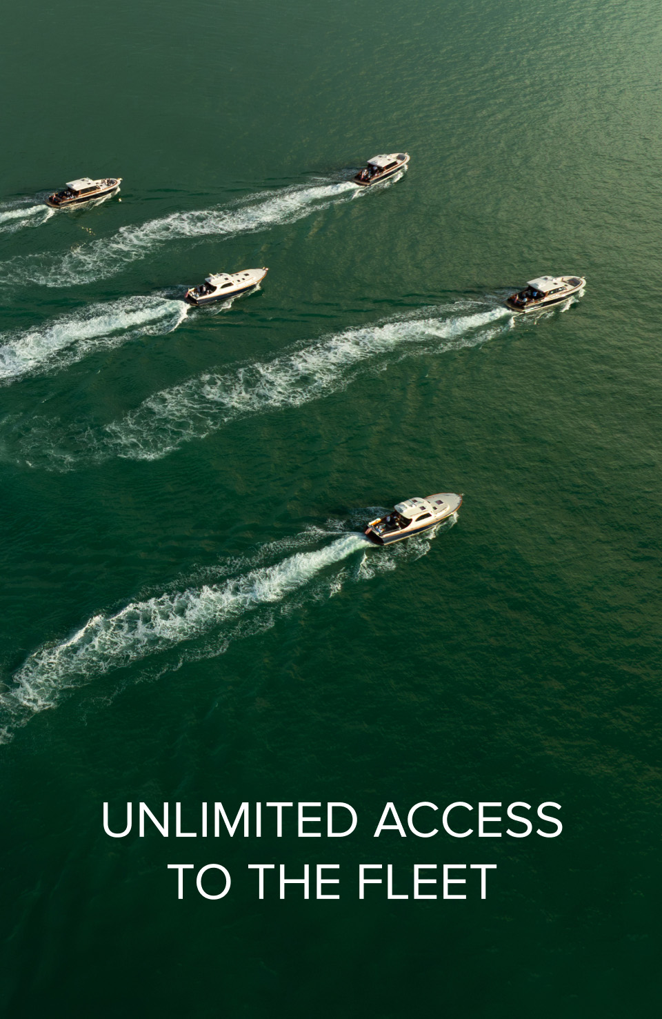 Aerial shot of a small fleet of B&G vessels cruising alongside eachother on aqua green water.