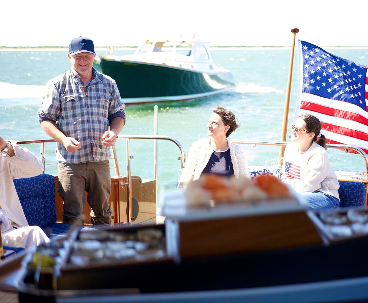 Fifth Bend Oysters crew member presenting oysters.