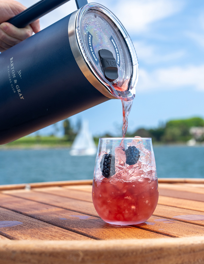 Blackberry cocktail in a glass with fresh berries and mint