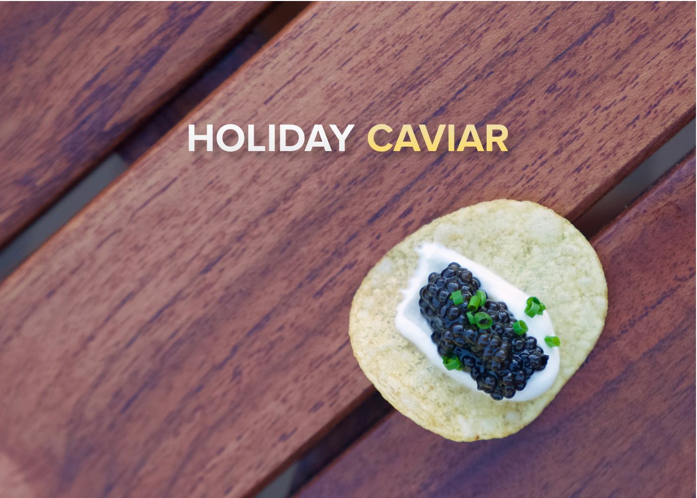 Crisp with crème fraîche and caviar on an oak wood background