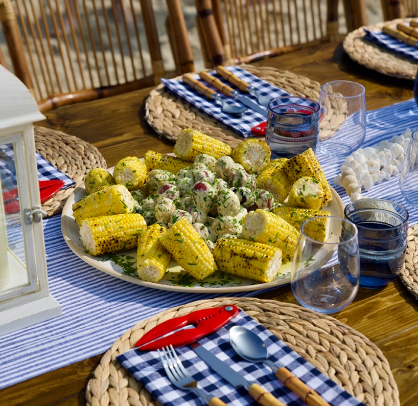 Lobster boil—steamed lobster and coastal dining setup